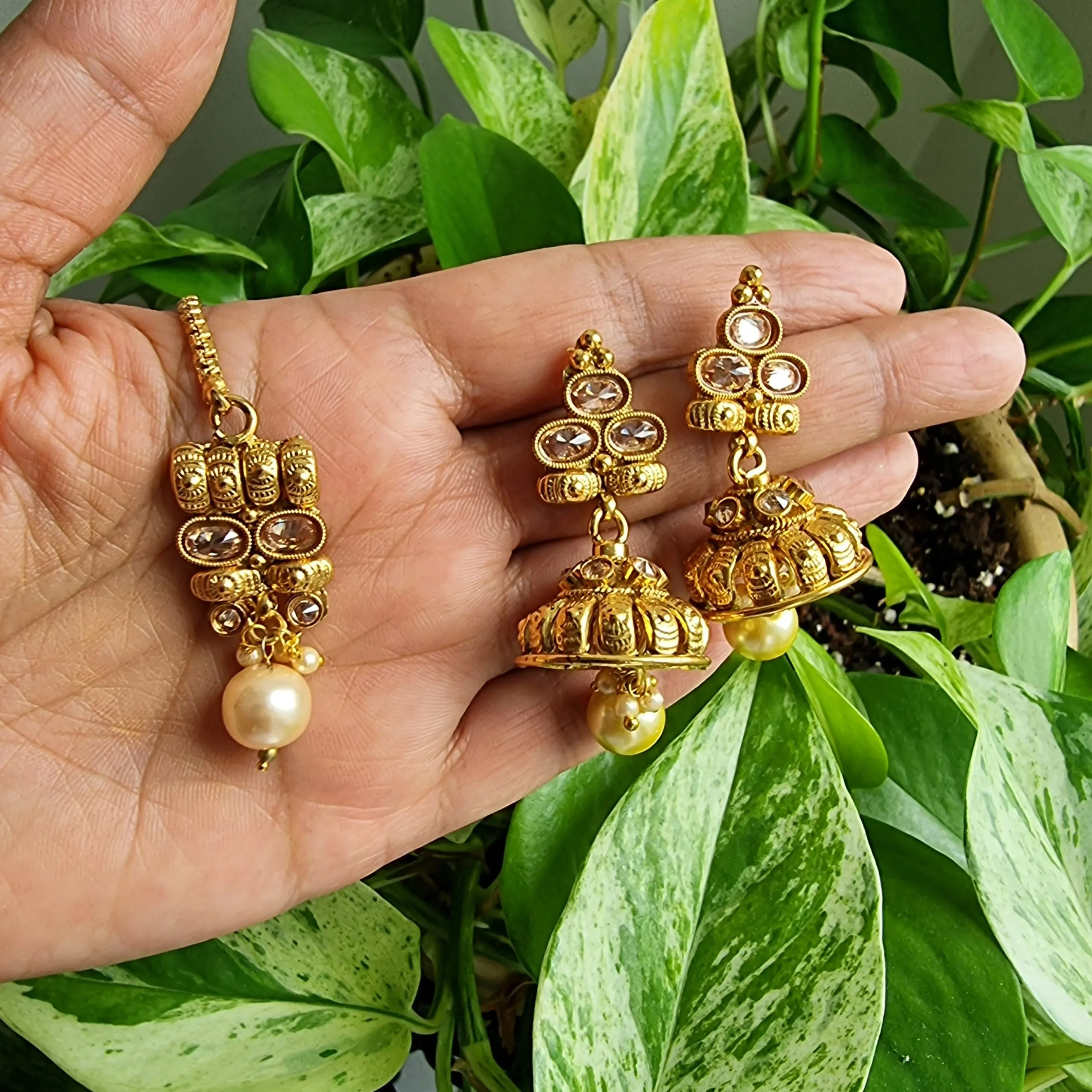 Exquisite Earrings and Tikka Set Adorned With Champagne Pearls