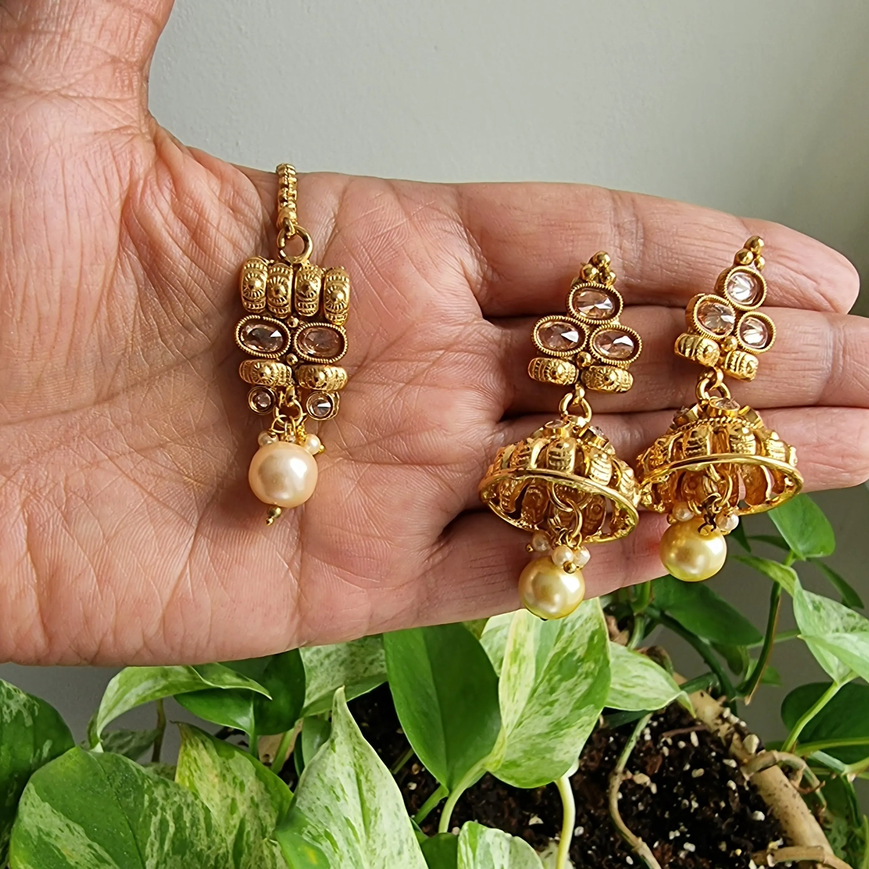 Exquisite Earrings and Tikka Set Adorned With Champagne Pearls